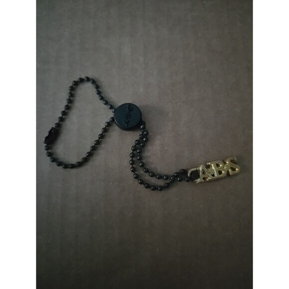 Unlabeled C.A.B.S. with Black Chain Pre-owned Unwrapped, Pendant Keychain - Picture 2 of 2